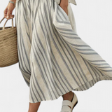Aurora – Comfortable Blouse and Striped Midi Skirt