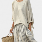 Aurora – Comfortable Blouse and Striped Midi Skirt