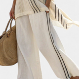 Raffaella – Elegant Beige Linen Blouse and Black Striped Trousers