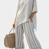 Fiorella – Elegant Asymmetric Blouse and Striped Trousers